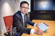 友邦香港及澳門首席財富管理總監張嘉駒表示，智能服務為投保人提供貼身的投資建議，更重要的是免收轉倉費。（林若勤攝）