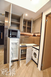 單位採開放式廚房設計，配備了一系列國際品牌家電。