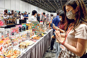香港美食博覽等多個展覽下周開幕，參展商正積極準備，趁着政府發放第二期消費券多做生意，不過大和預料今期消費券的正面影響將不如之前。（中新社）