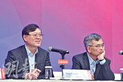 聯想董事長兼首席執行官楊元慶（左）預期個人電腦市場將於下半年復蘇，並承諾今年不裁員。（黃志東攝）