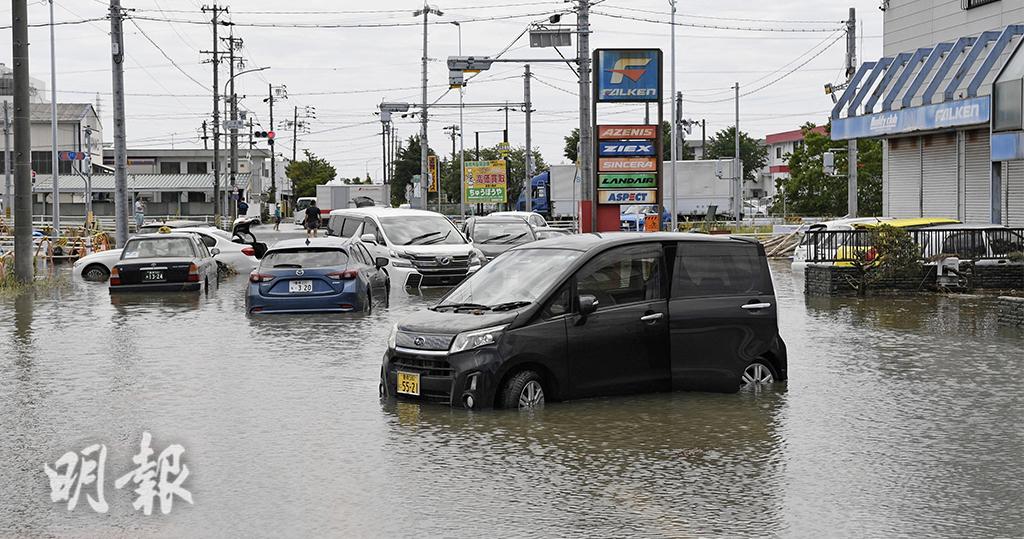 6月3日，日本愛知縣豐川市水浸仍然嚴重。（路透社）