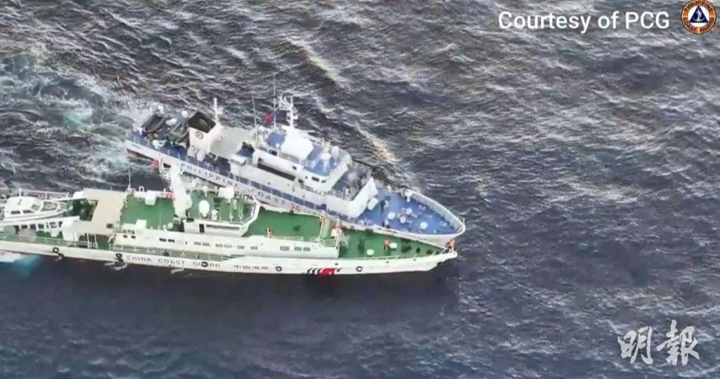 一艘中國海警船（下）和一艘菲律賓海岸警衛隊船隻（上）今早（5日）於南海發生碰撞。（法新社片段截圖）