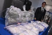 28岁金融高管涉嫌贩运1,200万元毒品回港，收取高额报酬2万港币，警方震惊逮捕