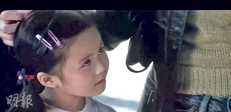 梁超怡6歲時參演《無間道》，飾演梁朝偉的女兒。（資料圖片）