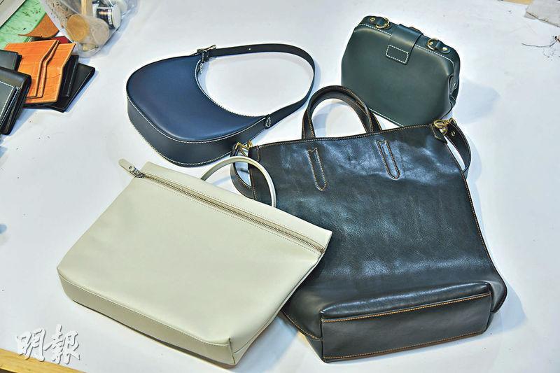 The Lederer除有自家設計的餃子袋（左上，$688）和金釦經典醫生袋（右上，$980），還可訂製其他皮具款式。（黃志東攝）