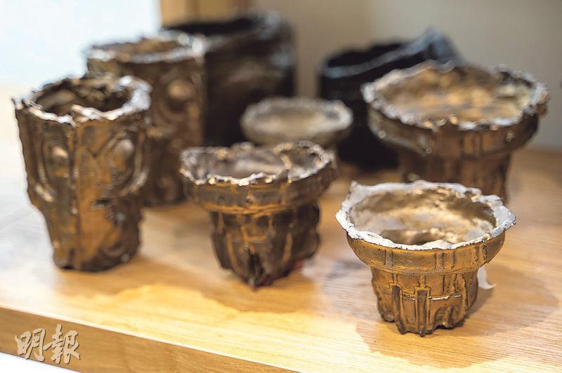 本地陶藝家陶啟安製作的植木鉢，以外星文化、古文明為靈感。（$490至$2000，SUNSI.CO）（林靄怡攝）