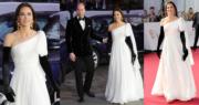凱特與威廉王子踏上紅地氈，據報她修改了2019年出席BAFTA頒獎禮時穿著的同一襲白色Alexander McQueen晚裝，不過黑色長手套惹負評。（法新社/Getty Images）