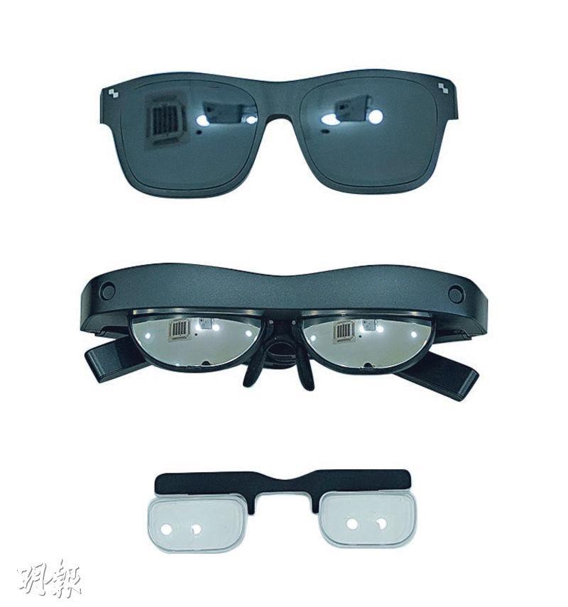 磁吸鏡架——NXTWEAR S眼鏡（中）內側及前方均有磁石吸附，分別用作吸附跟機的專用磁吸鏡架（下）及太陽鏡片（上）。有近視的用家，可在磁吸鏡架配上合適度數的鏡片來使用。（楊柏賢攝）