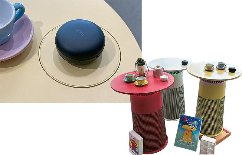型格實用--AeroFurniture官方指，桌面能夠承受114℃溫度，一般擺放熱茶等問題不大。圓形位置（上圖）是無線充電座，可為手機或耳機充電。（JJ攝）