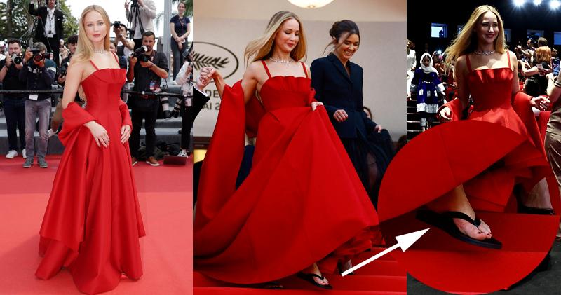 珍妮花羅倫斯出席監製紀錄片首映禮，穿著Christian Dior Couture紅色晚裝的她雍容華貴，但攝影師銳利的鏡頭，捕捉到她裙下原來穿著人字拖。（路透社/Getty Images）