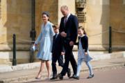 2022年4月17日，英國劍橋公爵伉儷威廉王子和凱特，與喬治小王子和夏洛特小公主在溫莎堡出席復活節周日崇拜。（法新社）