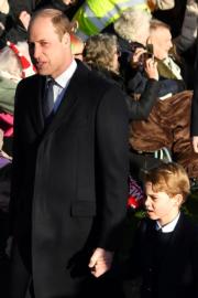 2019年12月25日，英國喬治小王子與爸爸威廉王子一同出席聖誕崇拜。（法新社）