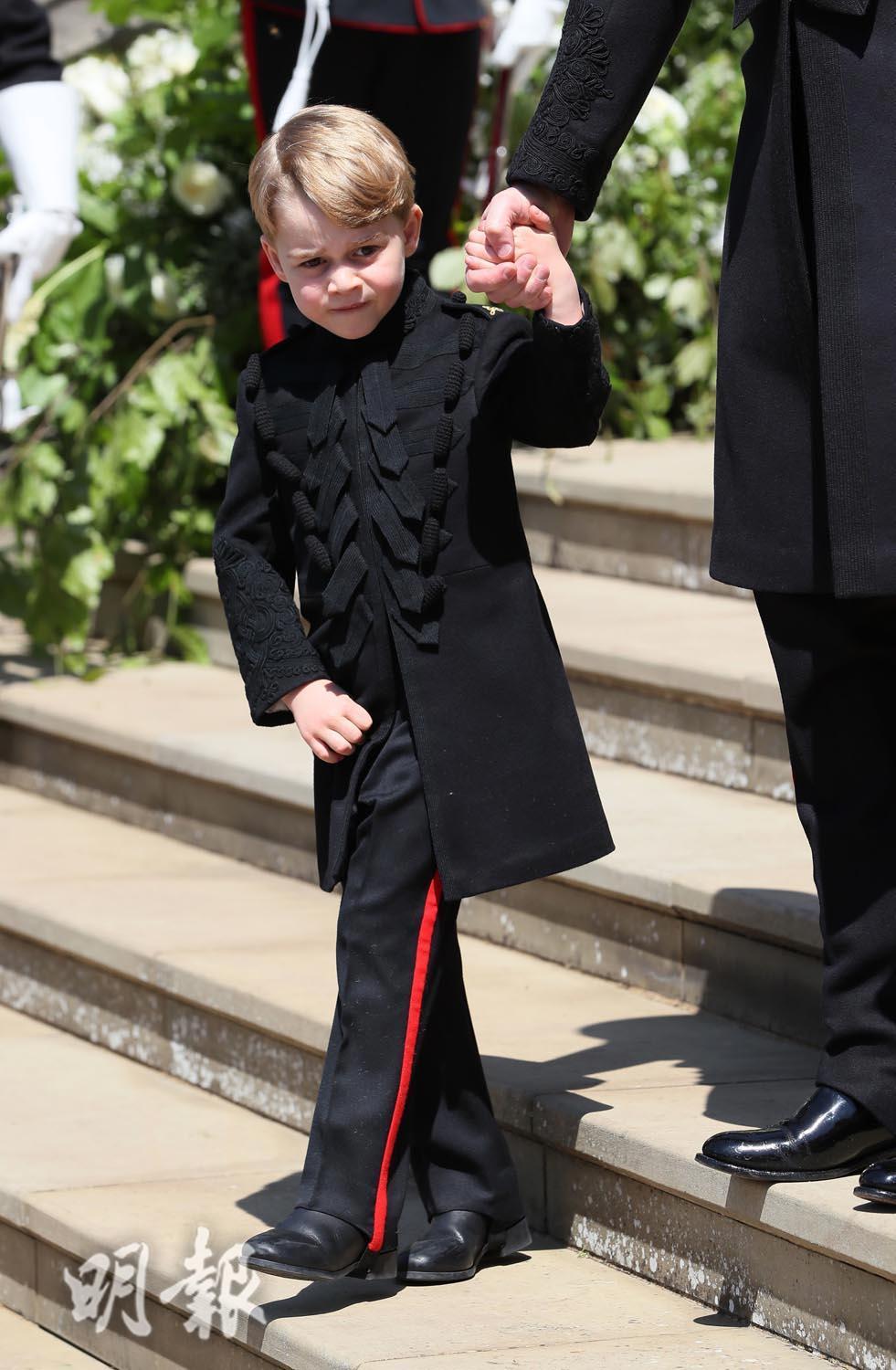2018年5月19日，喬治小王子在哈里王子梅根婚禮中再當花童。（法新社）
