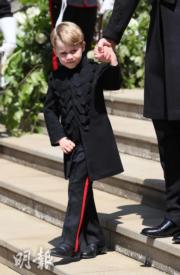 2018年5月19日，喬治小王子在哈里王子梅根婚禮中再當花童。（法新社）