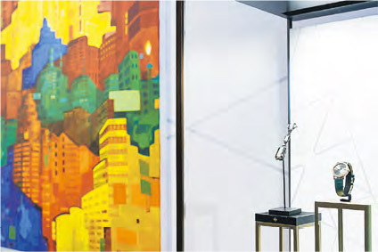 中國文化元素--香港藝術家趙綺婷的作品《五彩紛呈》運用飽和色調，象徵5種中國文化元素的平衡，配對品牌綠色主調時計。（品牌提供）
