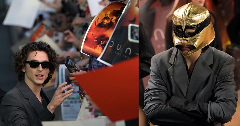 添密菲沙洛米為影迷簽名之餘，也貪玩戴上摔角手的面具。（法新社）