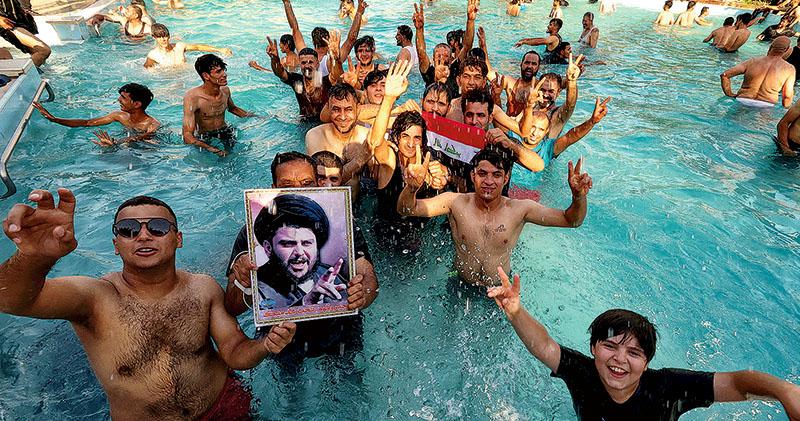反伊朗教士引退 激化伊拉克派系衝突 軍民巴格達激鬥30死700傷 全國一度宵禁