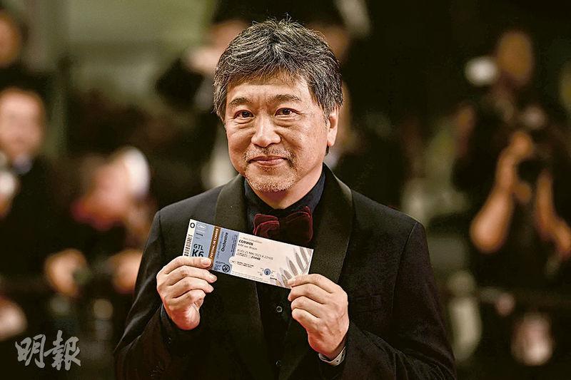 曾在《孩子轉運站》與宋康昊合作的日本導演是枝裕和，亦有出席《蜘蛛窩》首映禮。（法新社）