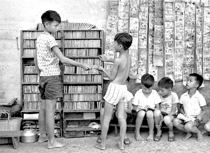 1964年的一個街頭租書攤擋。(網上圖片)